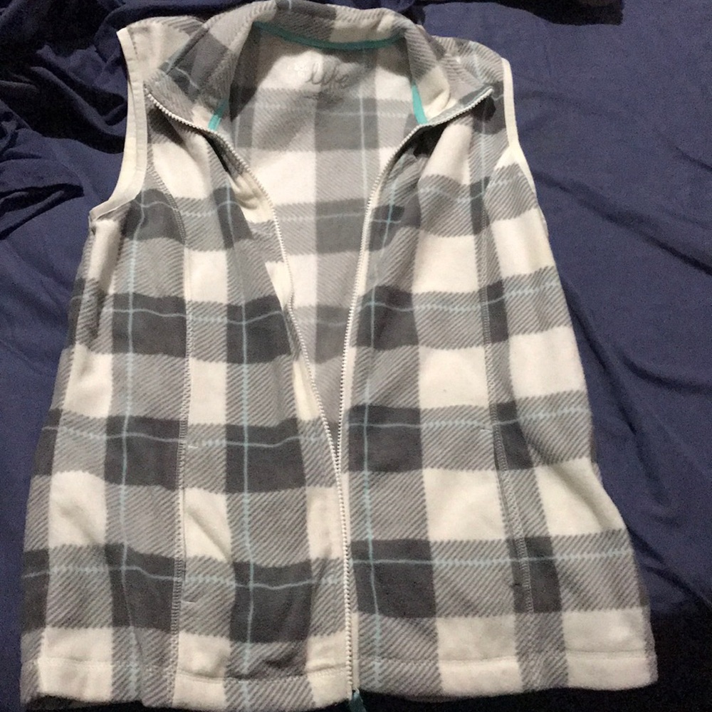 warm no sleeve zip up. (never worn)